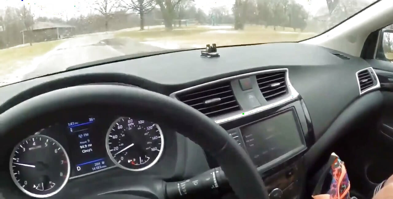 Teen Girl in Plaid Skirt Gets a Ride to School From a Stranger on a Snowy Day