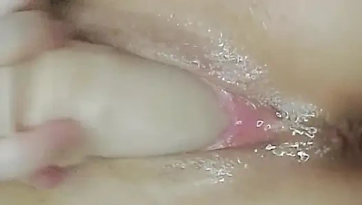 Playing with an Oiled Pussy Close-up