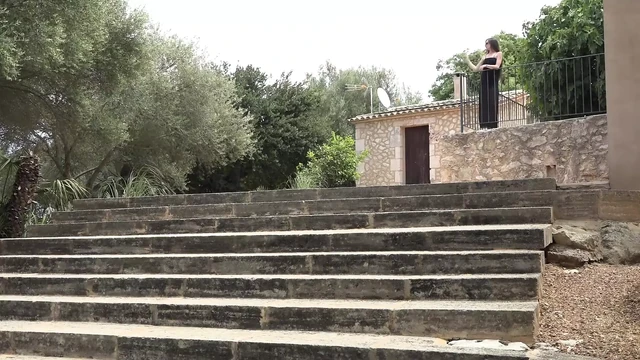 Stunning brunette babe enjoys pissing outdoors