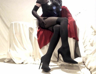 Kinky Crossdresser encased in nylon, sexy boots and leather