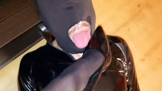 Slave licks Mistress's shoes