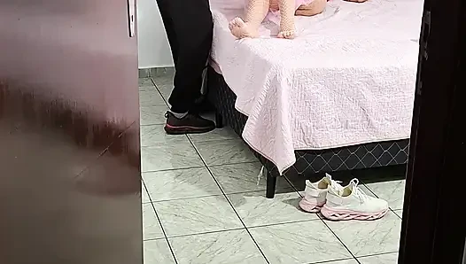 Stepfather helps stepdaughter take off her clothes to go to bed.