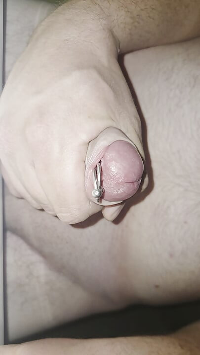 Cum trough piercing hole.