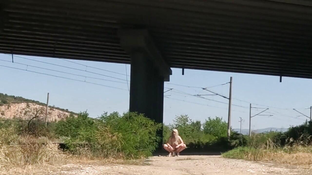 Slave Tih Shows Her Pussy and Tits Under the Bridge