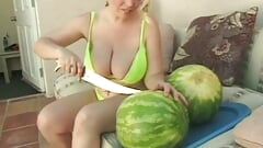 Kinky dude and blonde with huge tits get playful with a water melon then fuck outdoors