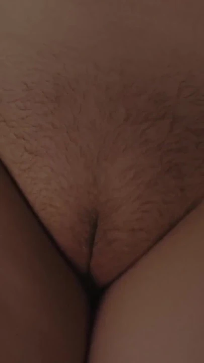 Key moment from "Nighttime marital sex. Close-ups of a hairy pussy."