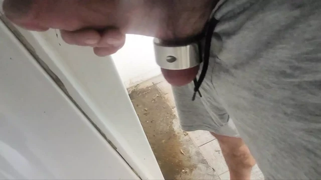 Big cock jerks off in public toilet