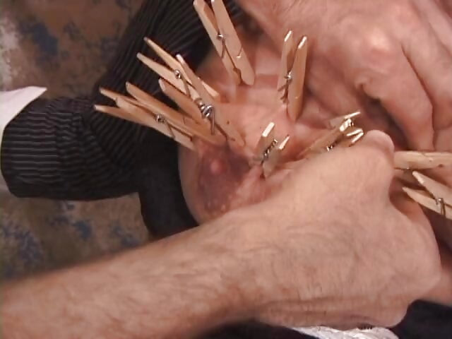 Hot girl gets tits pegged while she is in bondage