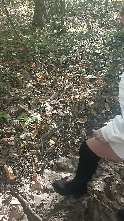 Slut Jade in the wood shows off in front of voyeur