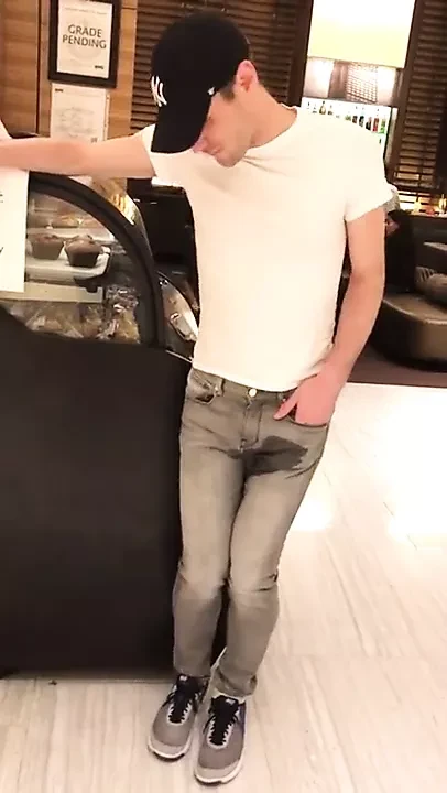 Boy piss in his pants in public