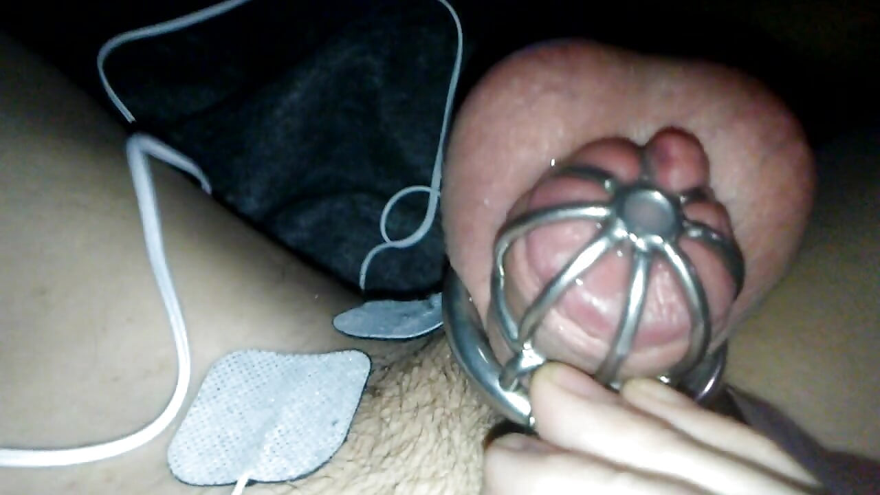 Pretty sissy Sadie caged e-stim orgasm