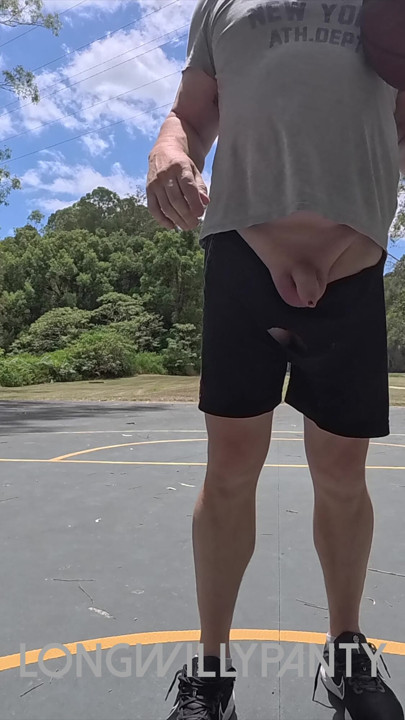 Straight guy hanging out his uncut cock at the public space.
