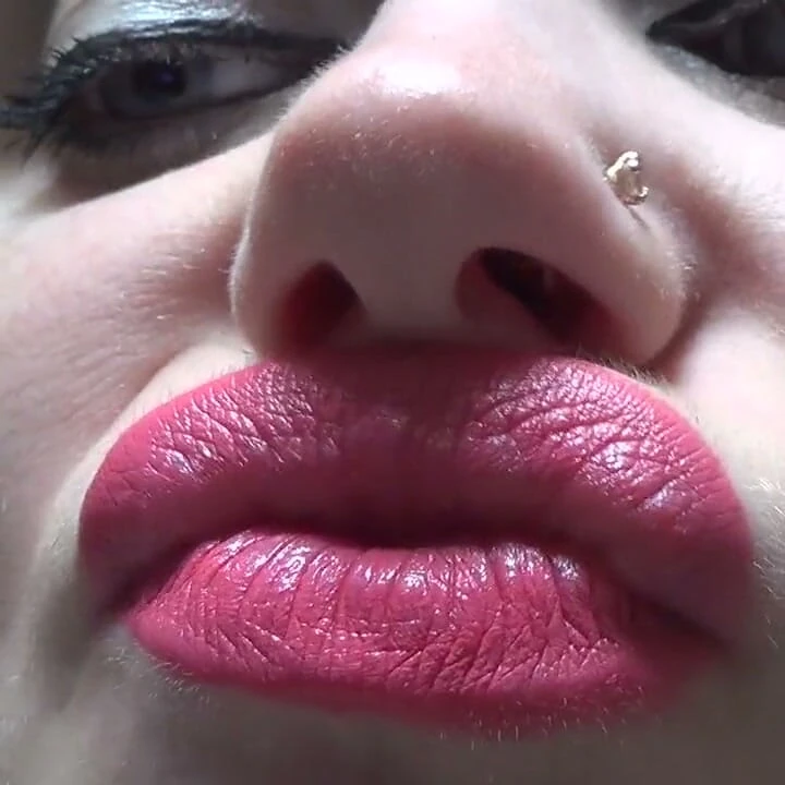 Kissing and duck face with big pink lips