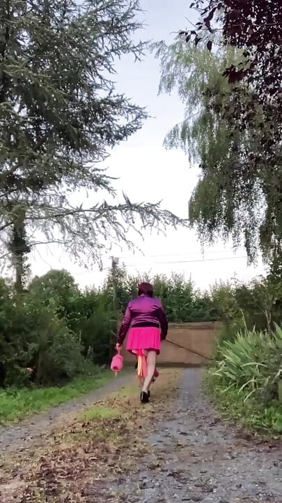 Dressed with a new pink skirt and the fuchsia tie stained with semen for a night out