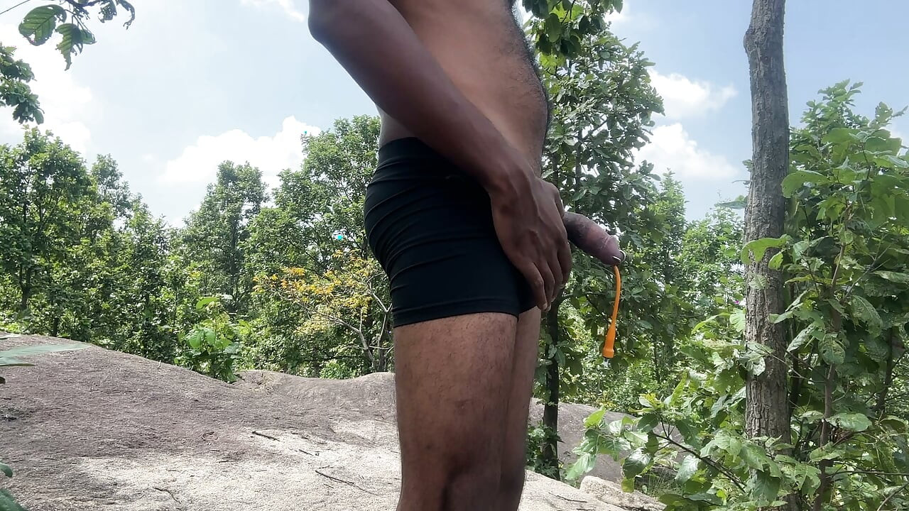 Flexing my body with my pierced cock and catheter inserted in outdoor