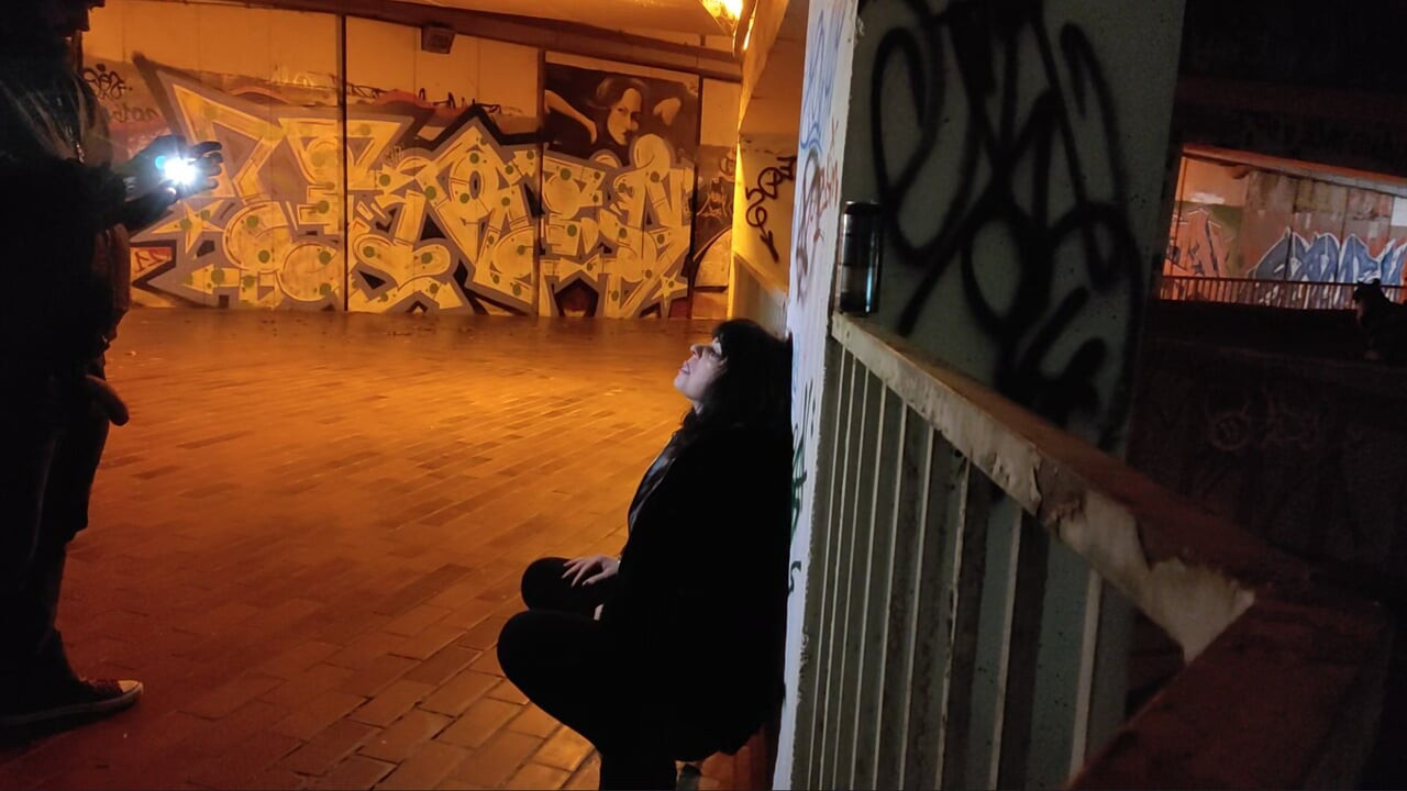 Whore degraded in parking garage