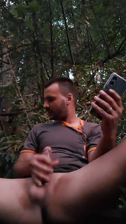 Handjob in the middle of the bush at dusk