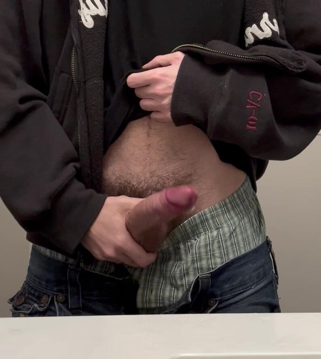 College stud shoots long cumshot in school bathroom