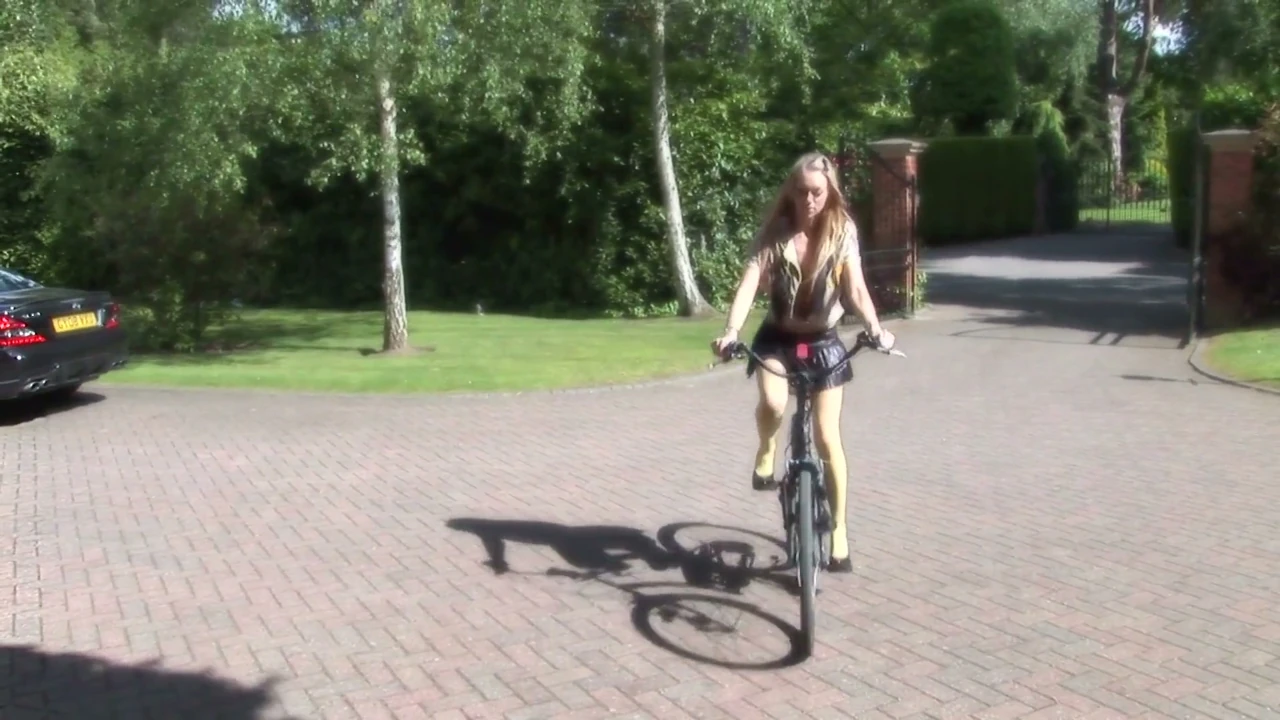 Hot ass blonde gets fucked while holding her bicycle