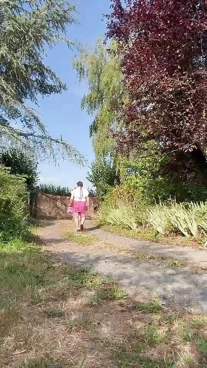 Dressed in a tight pink dress for an evening out