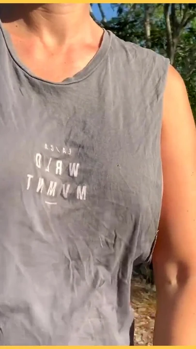 Captivating moment from "Wifey struts her stuff in a ripped shirt"
