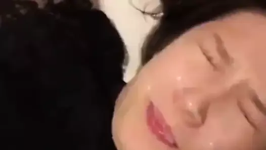 Giving a semen mask to a Chinese girl