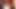 Vollbusige Rothaarige lutscht am Dildo