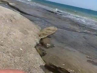 Passeggiata nuda sulla spiaggia di kos