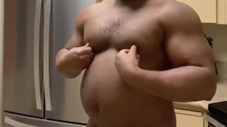Black muscle chub plays with his cock