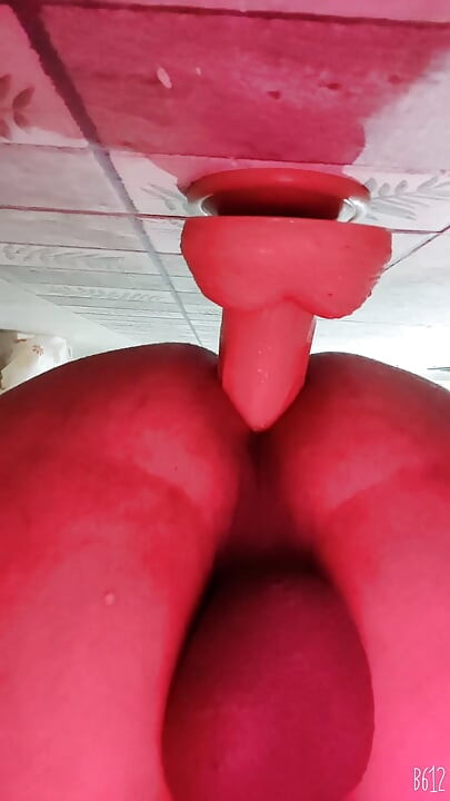 Crossdresser having fun with dildo