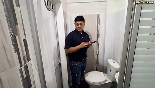 Teacher his student in the bathroom.