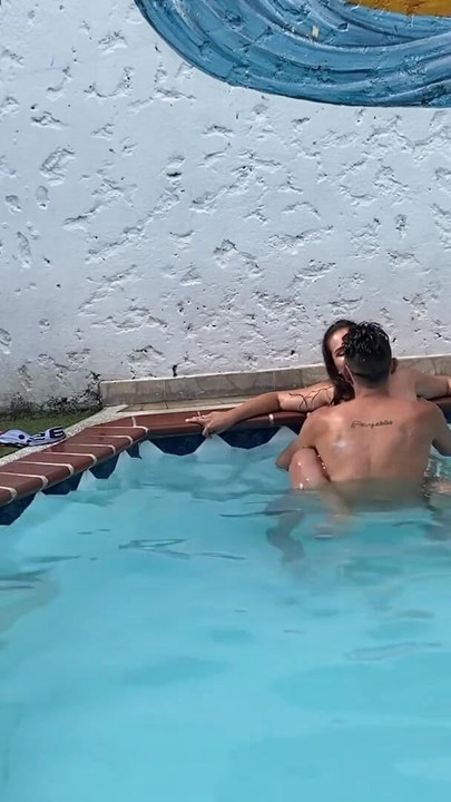 Iconic moment from "THE NEIGHBOR LEAVES HER HUSBAND AT HOME TO FUCK THE FIRST SEE IN THE POOL"
