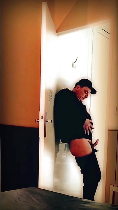 Jerk off and ass show in front of a door