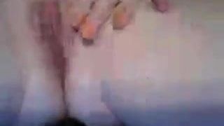 Fucking pink pussy with dildo