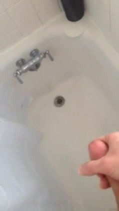 Jacking off and cumming in the shower