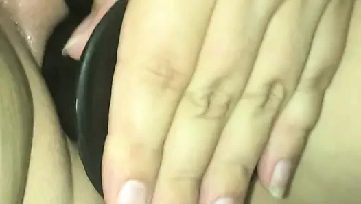 Playing with big dildo