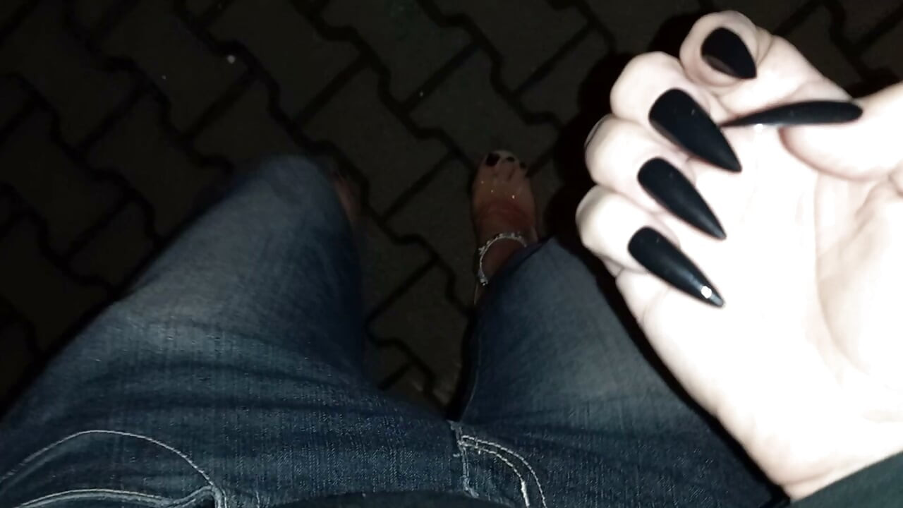 nighttime crossdressing on a public street in 20cm stripper heels, black toes, and black claws