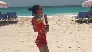 Victoria Justice dancing on the beach