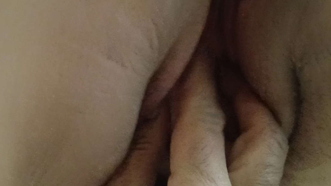 Playing with her pussy