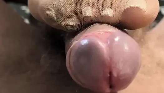 Footjob stoking nilon