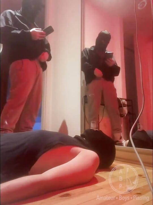 Amateur Boy Pissing in a Glass Held in His Friend's Mouth