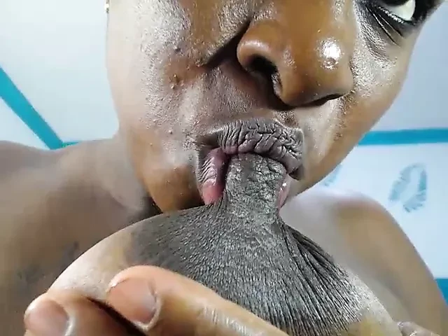 Latina ebony plays and sucks her huge nipples