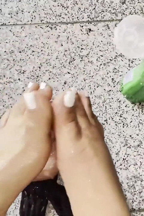 Tattooed MILF Teases Toy with Nylon Feet