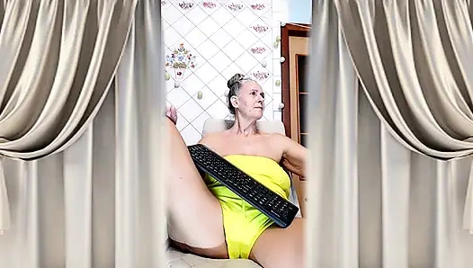 Cheerful Housewife Lukerya Shows Her Bare Feet in Kitchen. Mature Soles and Toes Close Up