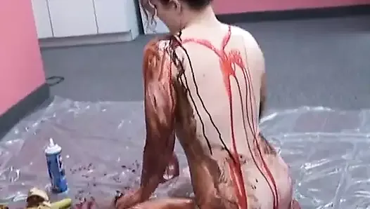 Horny bitch gets covered in whip cream and chocolate syrup