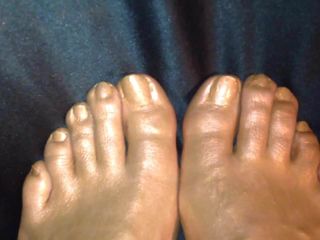 Goud-bronzen voeten geoliede spray