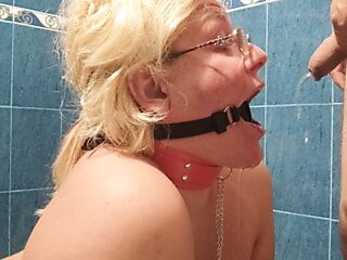 Pee in her mouth with gag and collar