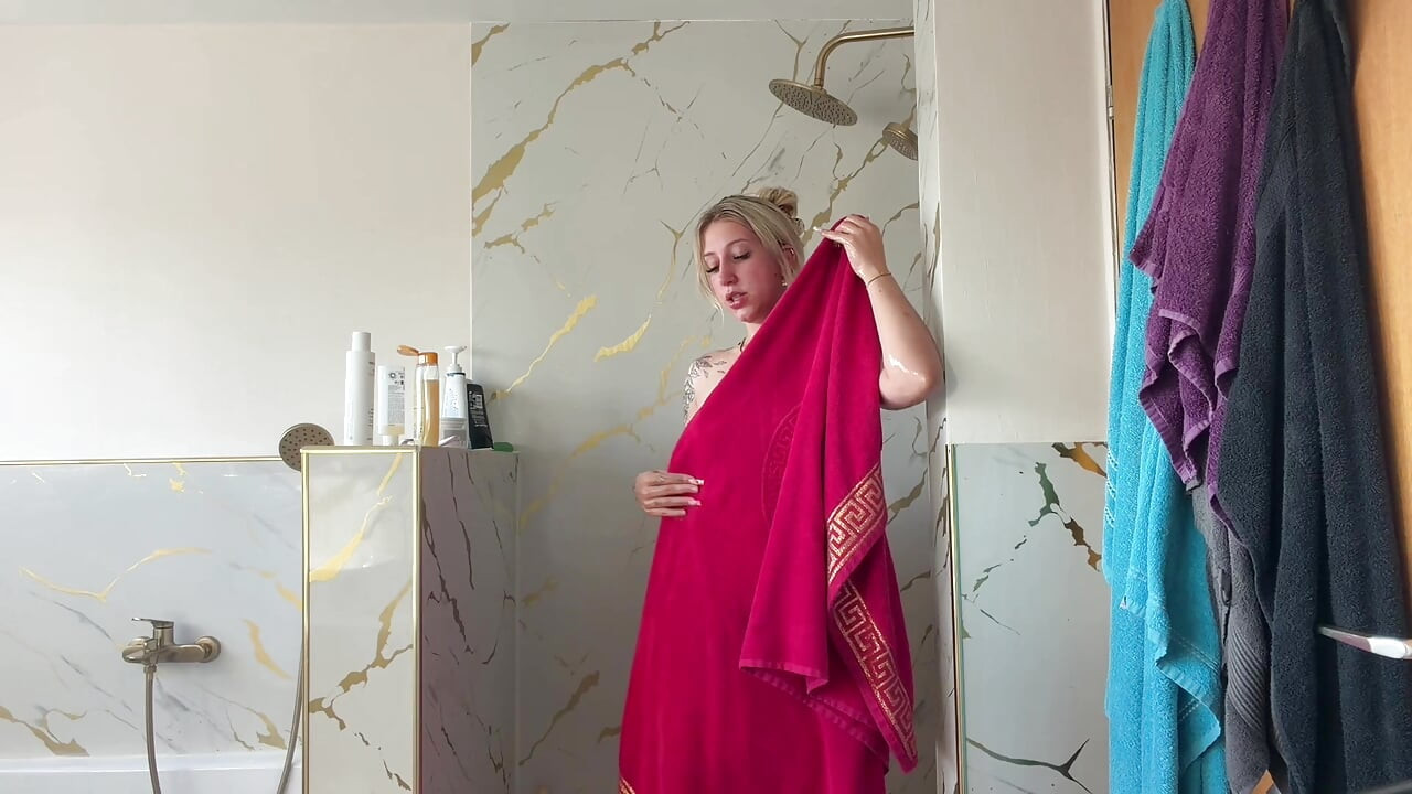 Blonde slut watched taking a shower