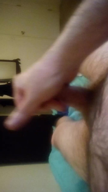 Masturbating