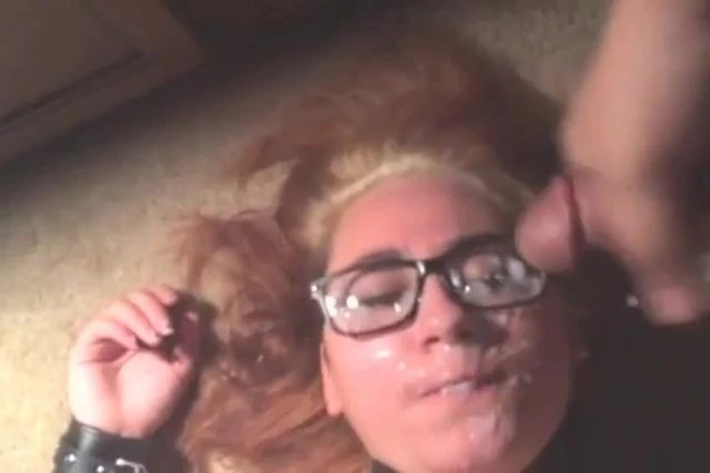Collared girl gets a huge facial